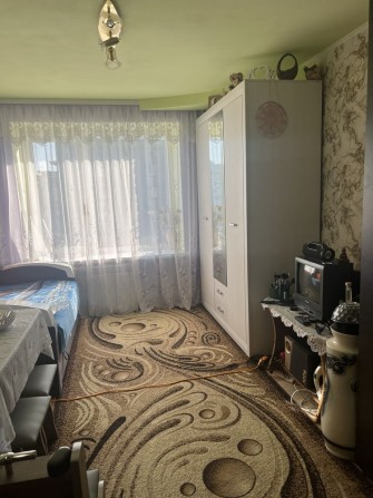 Продам кімнату  з  заведеними комунікаціями та пральною машиною - фото 1