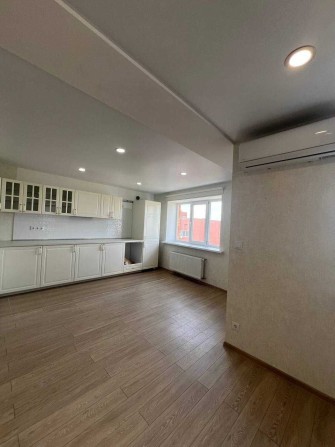 Продам квартиру-студию с ремонтом в новом доме - фото 1