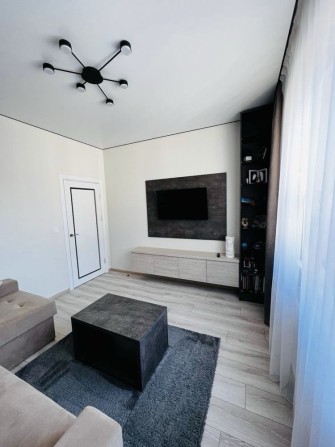 Продаж дворівневої квартири в новобудові з гаражем - фото 1