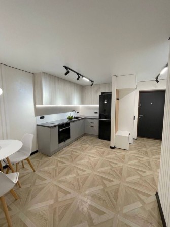 Продаж 2-кімнатної квартири з дизайнерським ремонтом в ЖК Riel City - фото 1