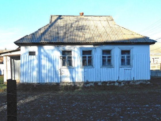 Будинок(ділянка) в центрі міста,під житло, або комерційну нерухомість Городище