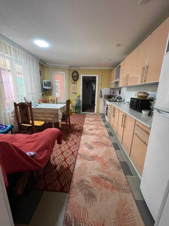 Продам 1/2 часть дома с отдельным въездом - фото 1