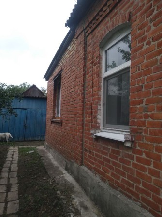 Продам 1/2 будинку в Ізюмі - фото 1