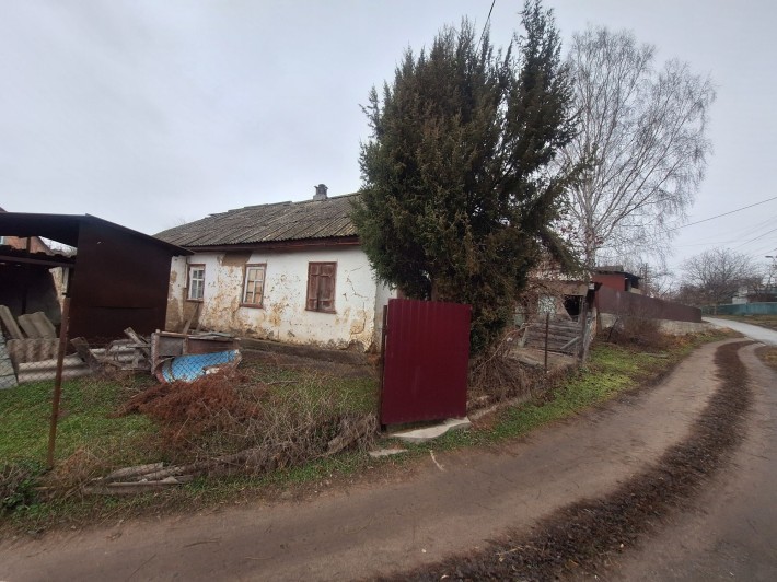 Будинок по вул. Захисників України 11 - фото 1