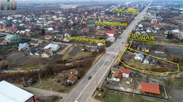 Ділянка з будинком біля дороги. - фото 1