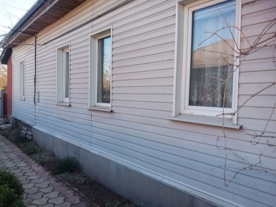 Продам пол дома в центре города Конотоп