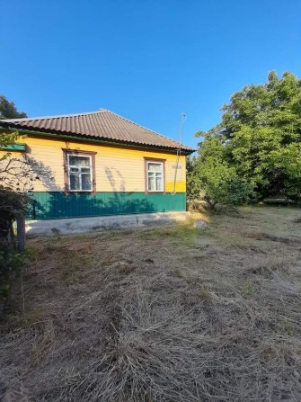 Продам будинок і земельну ділянку по центральній вулиці Коростеня - фото 1