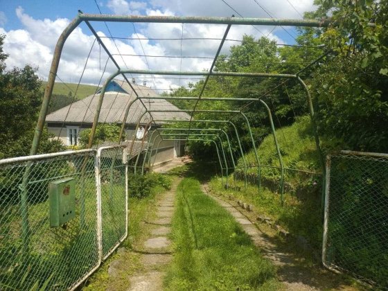 Житловий будинок із господарчими будівлями та земельною ділянкою Могилев-Подольский