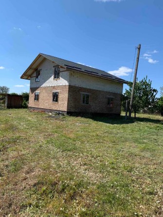 Боголюби Будинок, земельна ділянка 23 сот. центр села - фото 1