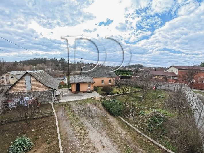 Продаж житлового будинку з ділянкою 25 соток, 2 заїздами в с.Ходосівка - фото 1