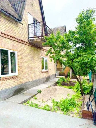 Продам будинок с.Ходосівка.Літня кухня,гараж,камін,6 соток - фото 1