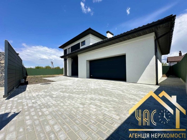 Продам якісний будинок з гаражем  в Крюківщині, 216м2/6 сот - фото 1