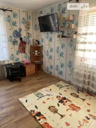 Кімната з косметичним ремонтом в цегляному будинку - фото 1