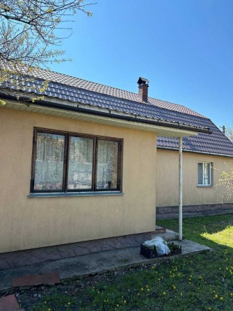 Великий двоповерховий будинок зі своїм садом по головній вулиці - фото 1