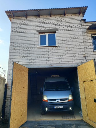 ГСК Супутник 3 Троещ. Базар 60 кВ. Двоповерховий - фото 1