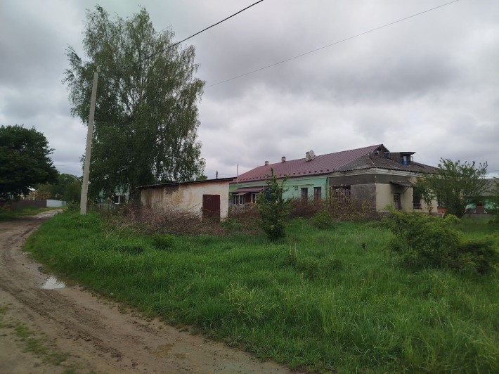 Житло, квартира, частина будинку і 0,07 га землі, міські комунікації - фото 1