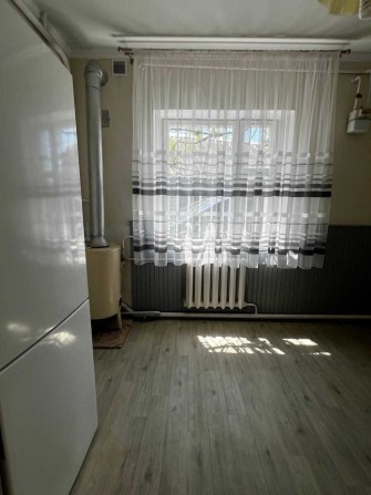 Продам дом с капитальным ремонтом в Малиновском районе - фото 1