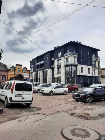 Комерція в центрі міста в новобудові - фото 1