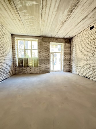Продаж приміщення на першому поверсі в ЖК Олімп, фасад - фото 1