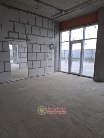 Продам офисное помещение 105 кв.м в новом сданном доме на ул.Сахарова! - фото 1