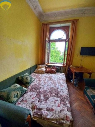 Комната в коммуне в центре на ул. Ольгиевская - фото 1