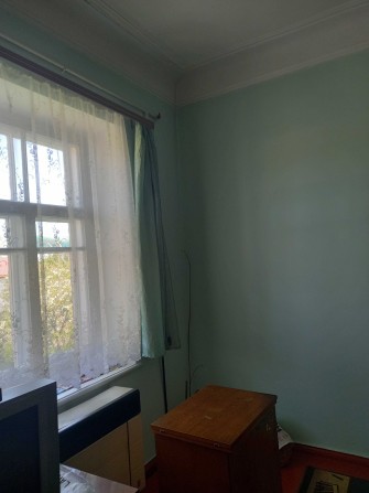 Квартира з земельною ділянкою. - фото 1