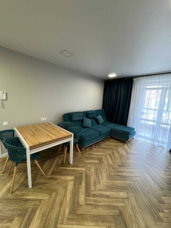 Продам 2 кімн. квартиру в новобудові з ремонтом - фото 1