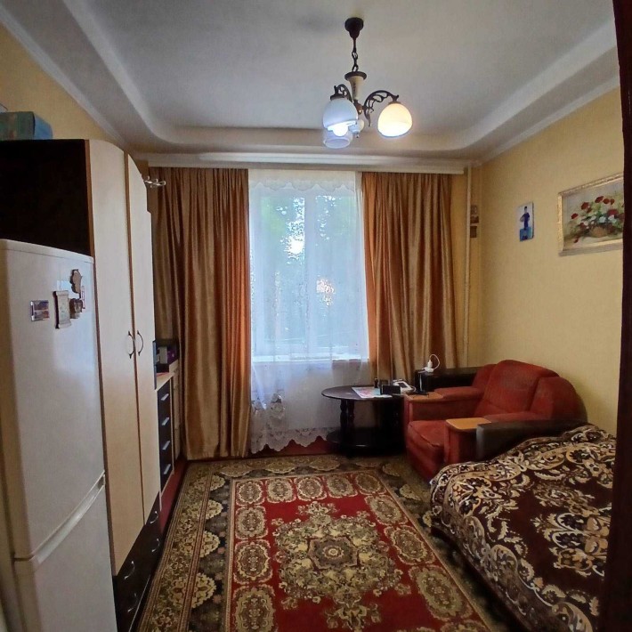 Продам 1-но  кімнатну гостінку в центрі - фото 1