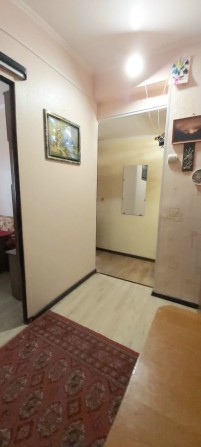 Продам 2 комнатную квартиру,  1 этаж с пристройкой - фото 1