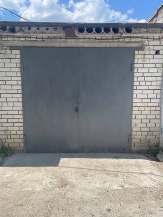 Продам гараж Тополь 1 район 18 дома - фото 1