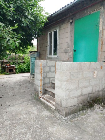 Продається  1/2 будинку в Романково, біля 28-ї школи. - фото 1