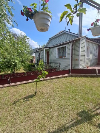 Продам 1/2 будинку в районі міської лікарні - фото 1
