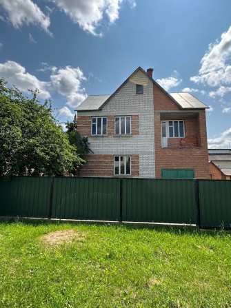 Продам двоповерховий будинок (новобудова) з гаражем у Лубнах. - фото 1