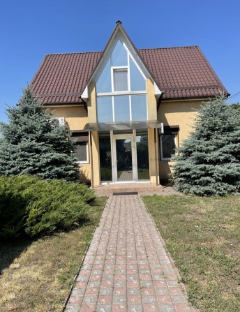 Продам  дом с авторским проектом в Подгородном. - фото 1