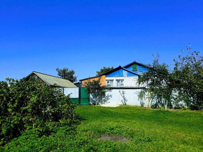 1/2 будинку,частка складає 74м2,в м.Корюківка - фото 1