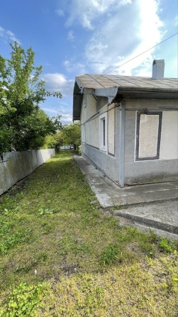 Продається будинок з літньою кухнею та великою ділянкою - фото 1