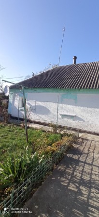 Продам земельну ділянку з будинком під реконструкцію. - фото 1