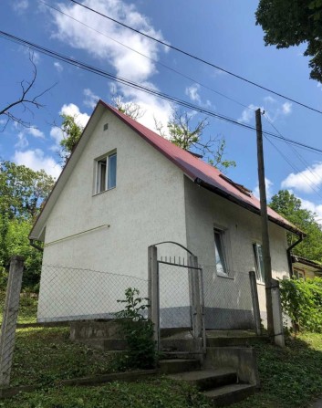 Центр міста,частина будинку, 6 сот.землі - фото 1