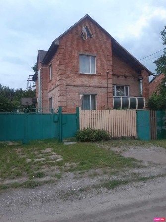 Міцний двоповерховий цегляний будинок (р-н Лелеківка) - фото 1