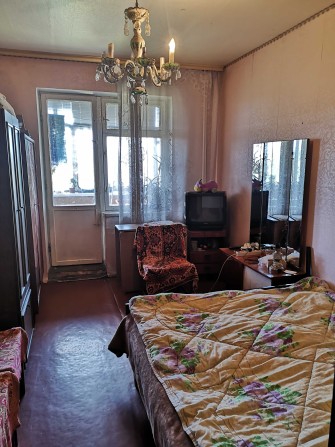Кімната з балконом для жінки. Райдужна 7, вид на озеро - фото 1