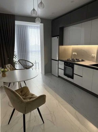 Затишна 1-на квартира площа 52м.кв. - фото 1
