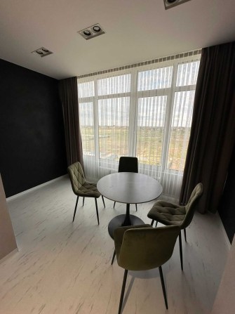 Продам 1-ком квартиру с Дизайнерским ремонтом - фото 1