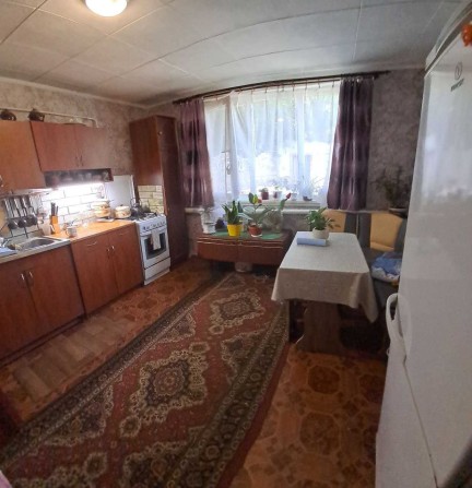 Продам 1\2 частину  будинку в центрі міста Чугуїв! - фото 1