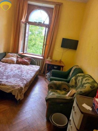 Комната в коммуне в центре на ул. Ольгиевская - фото 1
