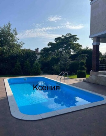 Стильный дом с бассейном - фото 1