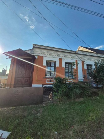 продаж частини будинку в центральній частині міста - фото 1