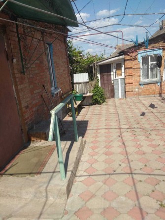 Продам полдома в г. Никополь - фото 1