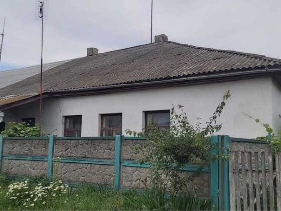 Продаж будинку/квартири + земельна ділянка під гараж Бершадь