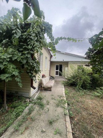 Продам дом в Подгородном - фото 1