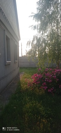 Продам дом в Подгороднем,76м2,на зем. уч. 0.109га,ул.Жовтнева228 - фото 1